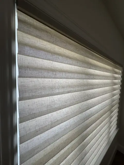 Close-up of sheer shading vanes softening the daylight